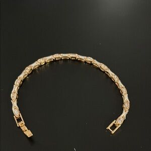 Intricate Gold toned and Silver Braided Bracelet with crystal accents and Clasp